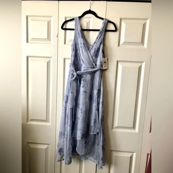 DKNY Blue flowery dress. New with tags, never been worn.